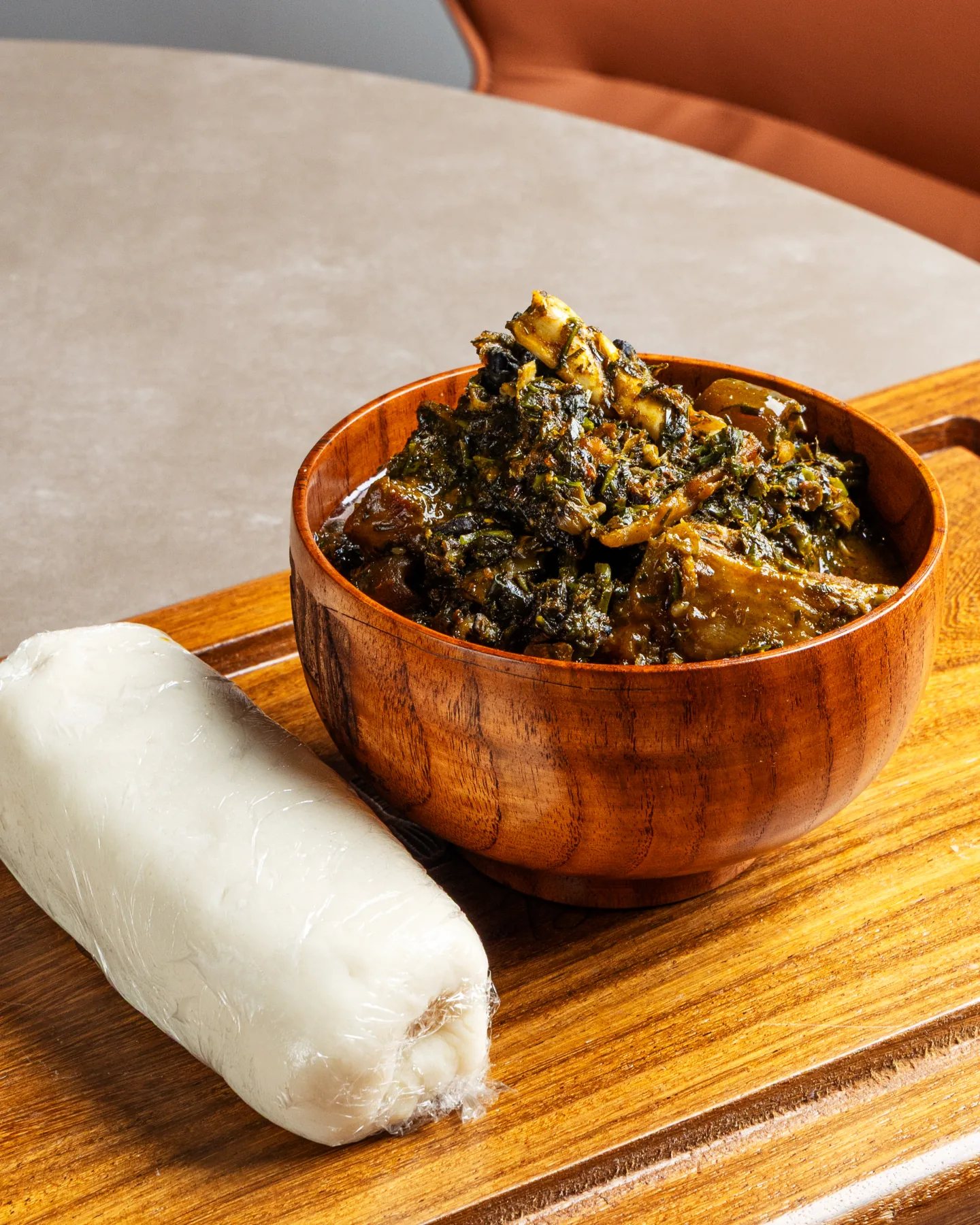 Evenana vegetable soup served with swallow